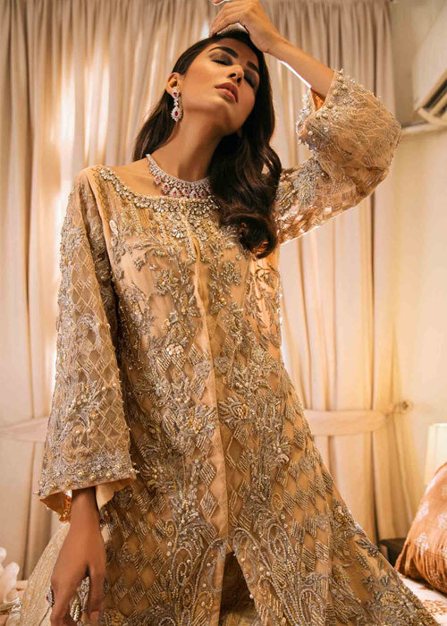 Exquisite Beige Net Engagement Ensemble: Embroidered Gown, Sharara, and Dupatta Set with Pearls and Crystals